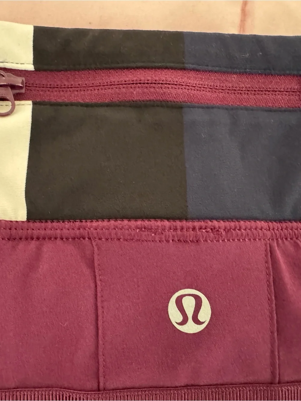 lululemon Run Pace Setter Skirt skort in plum pow stripe, size 8 pleated back